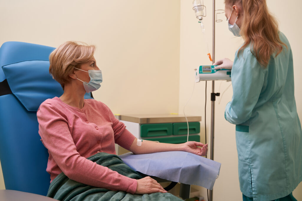 Attentive female person looking at dropping equipment